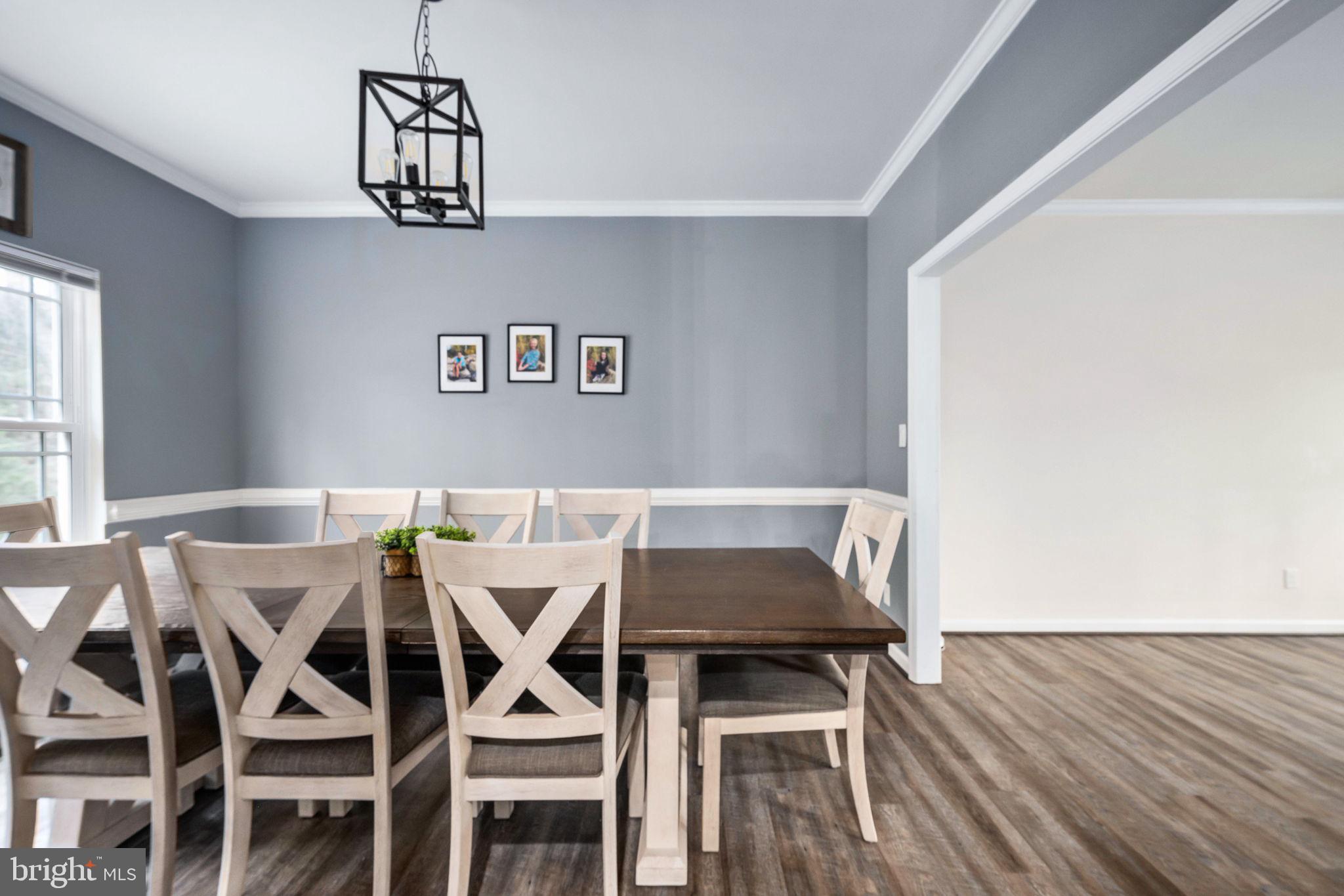 794 White Oak Road Fredericksburg, VA 22405 - Photo 25 of 70 a view of a dining room with furniture and wooden floor