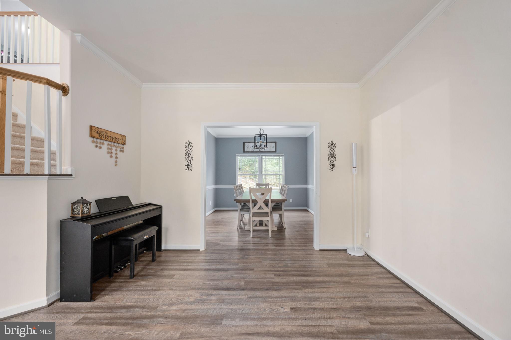 794 White Oak Road Fredericksburg, VA 22405 - Photo 26 of 70 a view of a dining room with furniture window and wooden floor