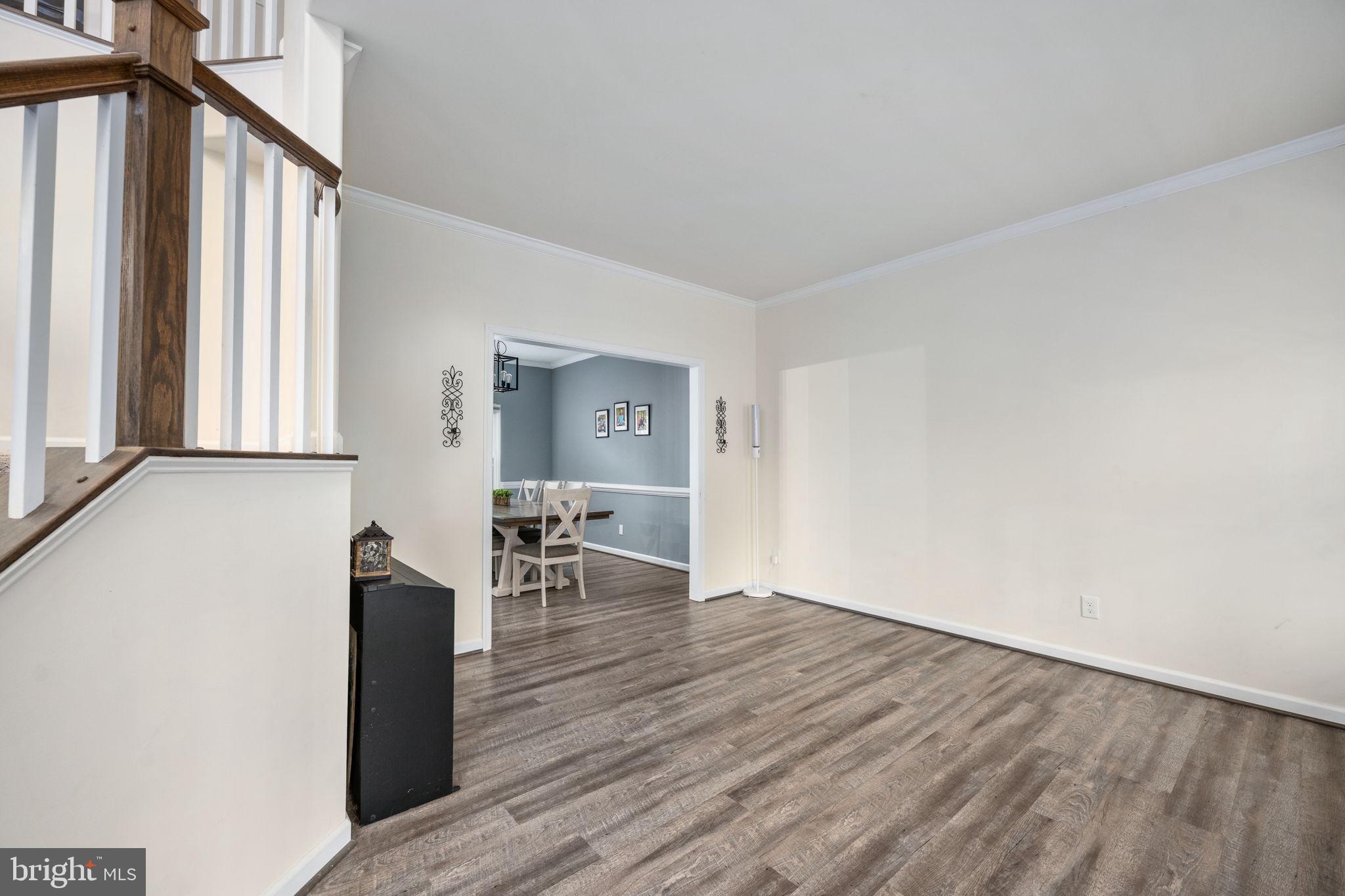 794 White Oak Road Fredericksburg, VA 22405 - Photo 27 of 70 a view of empty room with wooden floor and fan