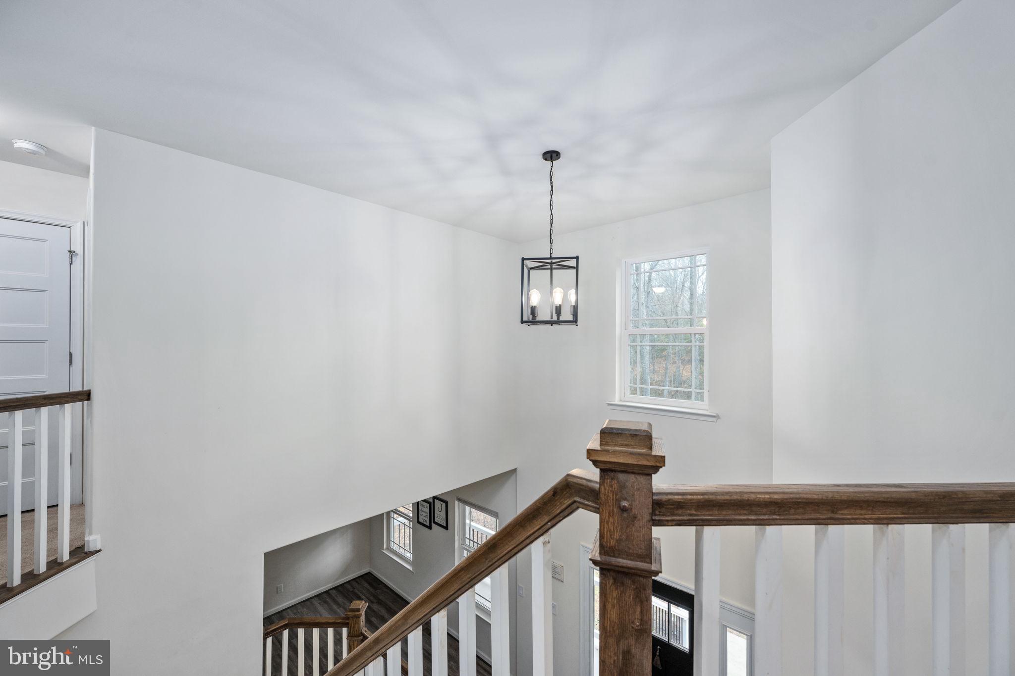 794 White Oak Road Fredericksburg, VA 22405 - Photo 31 of 70 a view of a hallway with windows