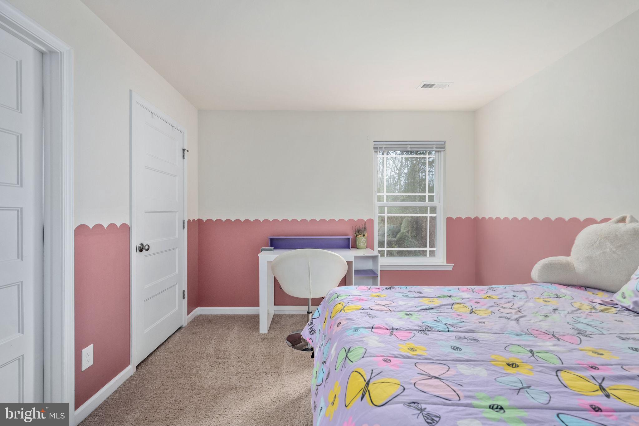 794 White Oak Road Fredericksburg, VA 22405 - Photo 33 of 70 a bedroom with a bed and a window