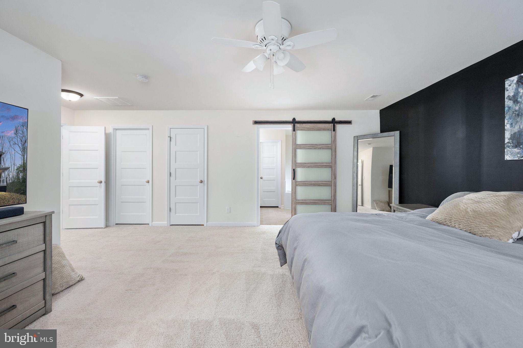 794 White Oak Road Fredericksburg, VA 22405 - Photo 40 of 70 a view of empty room with closet and ceiling fan