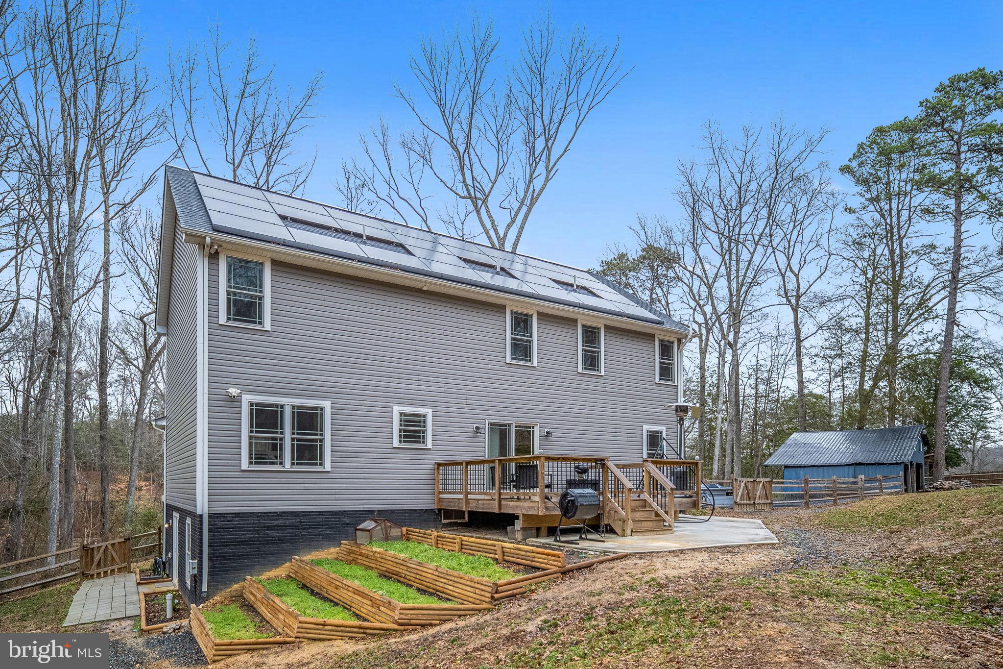 794 White Oak Road Fredericksburg, VA 22405 - Photo 57 of 70 a view of a house with backyard