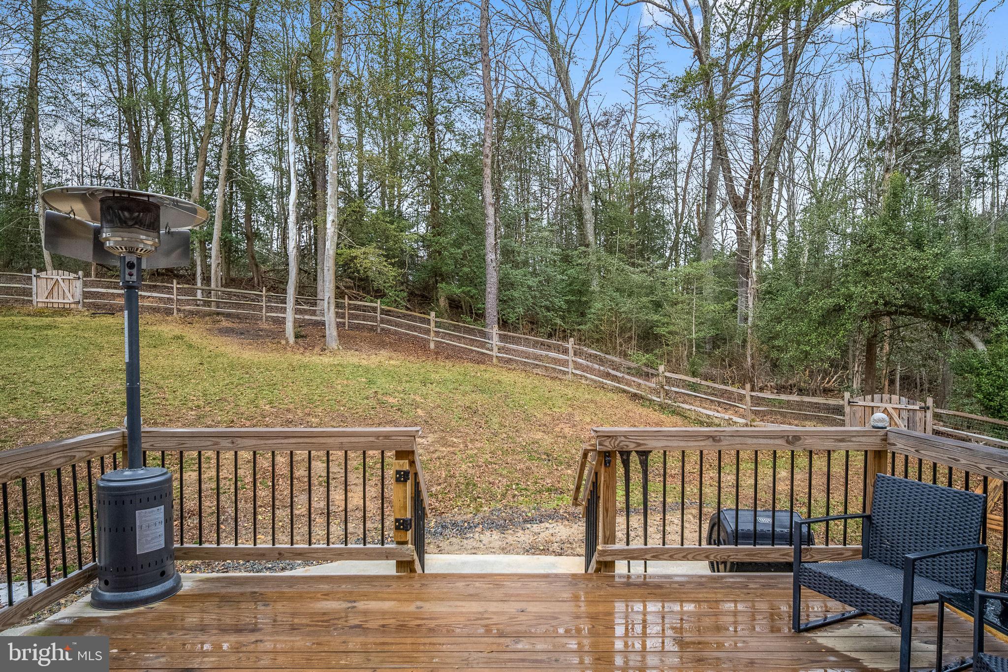 794 White Oak Road Fredericksburg, VA 22405 - Photo 63 of 70 a view of a patio with two chairs and a table