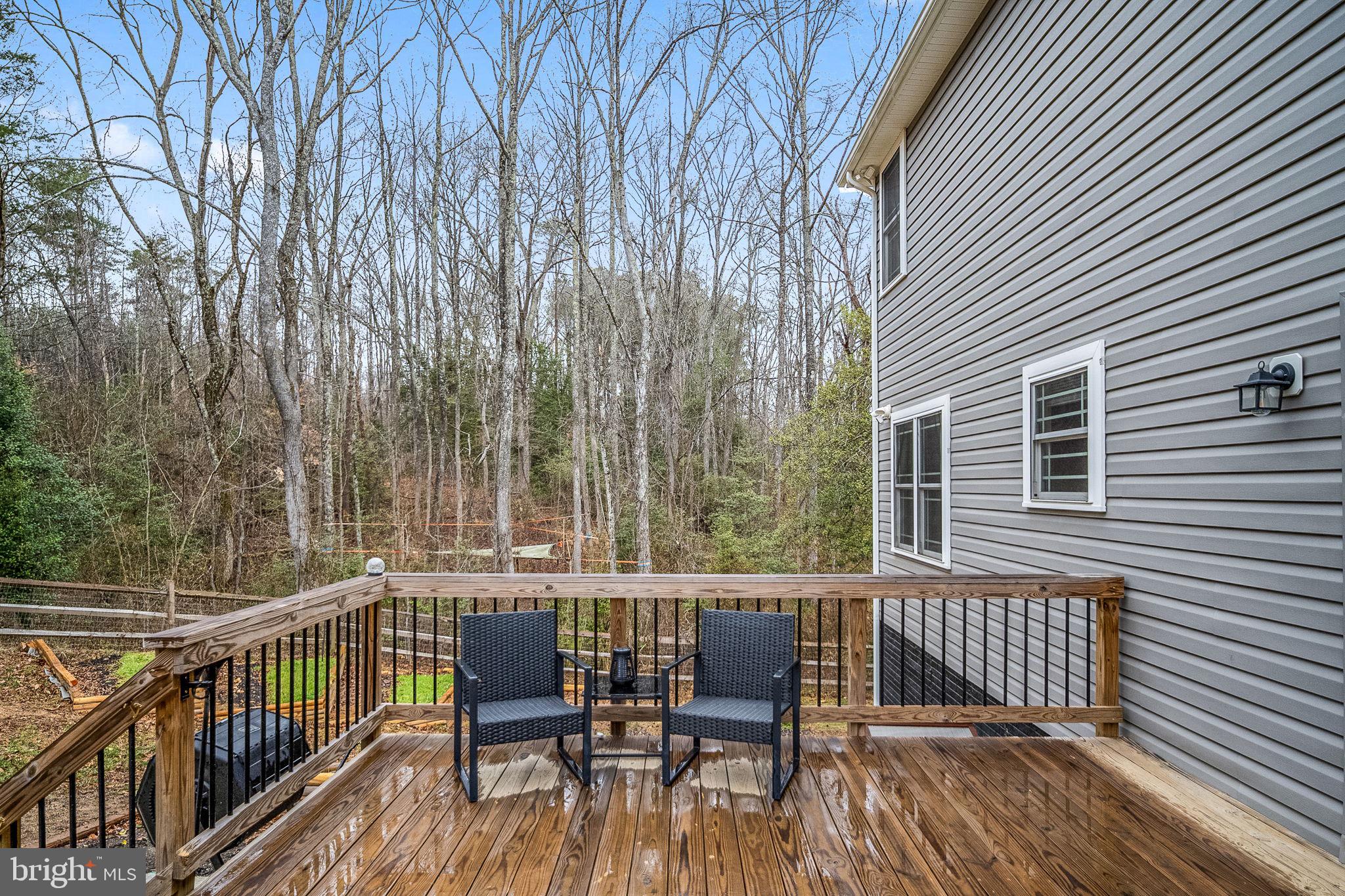 794 White Oak Road Fredericksburg, VA 22405 - Photo 64 of 70 a view of a chair and table on the deck