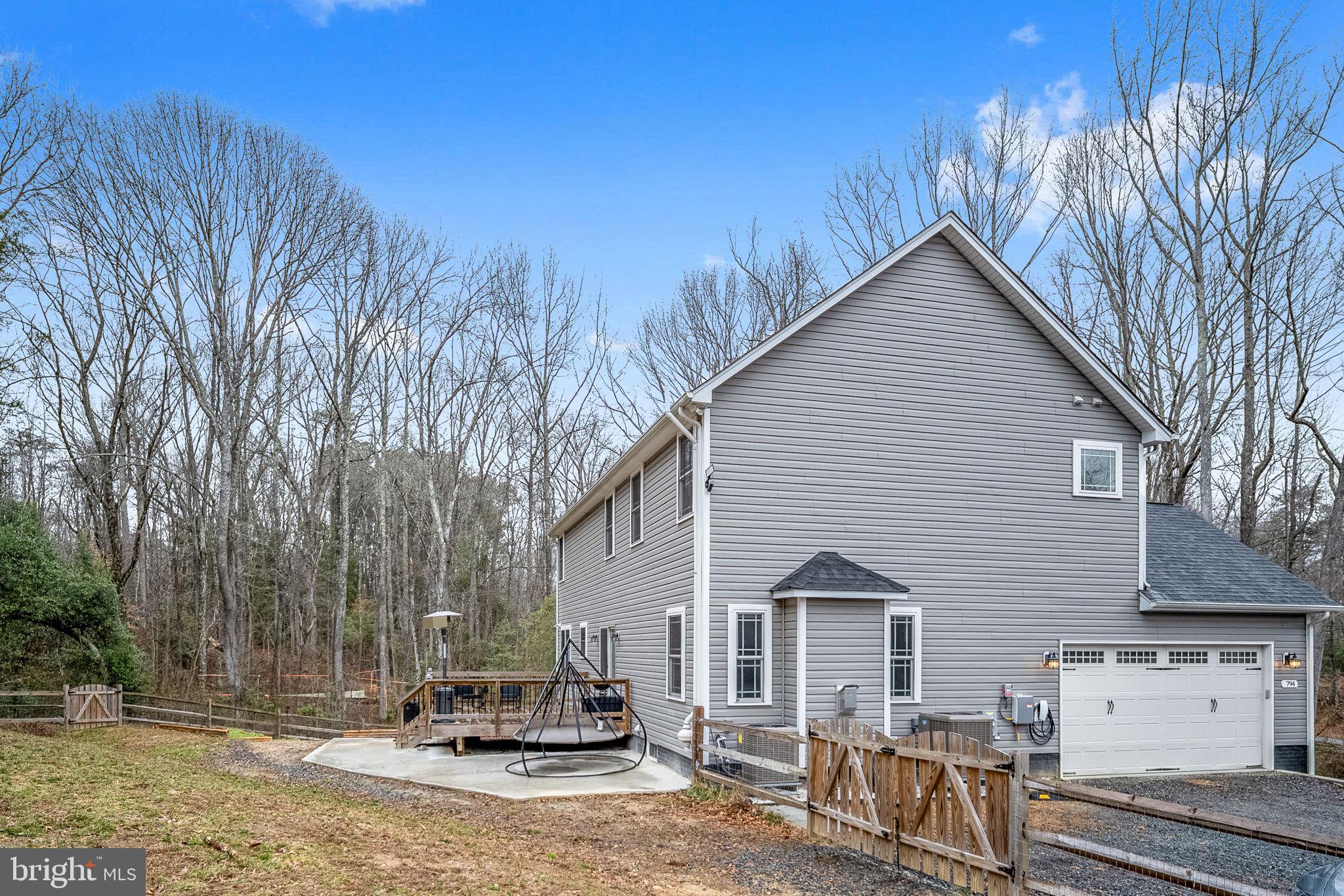 794 White Oak Road Fredericksburg, VA 22405 - Photo 66 of 70 a front view of a house with a yard