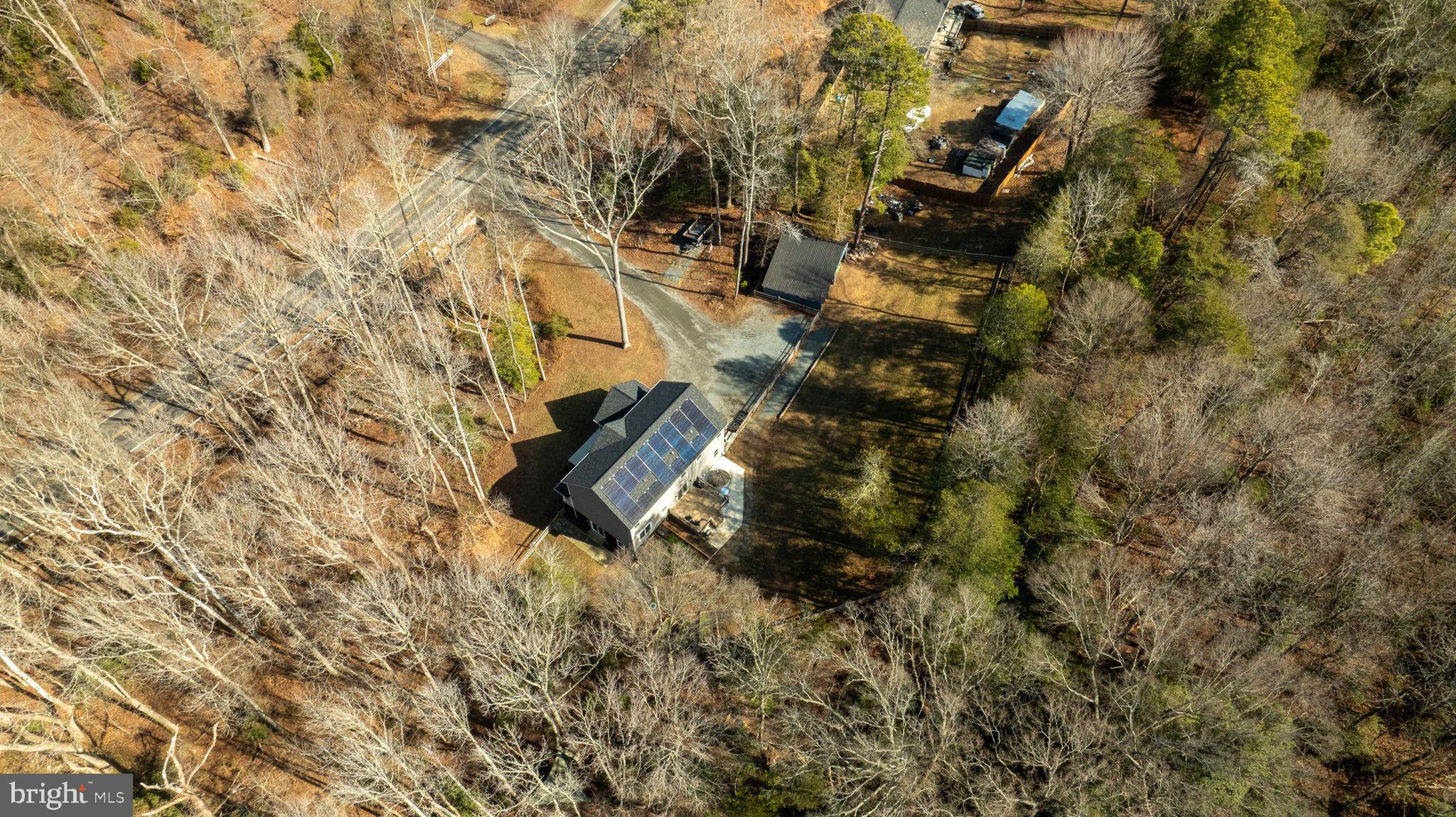 794 White Oak Road Fredericksburg, VA 22405 - Photo 67 of 70 a backyard of a house with lots of green space