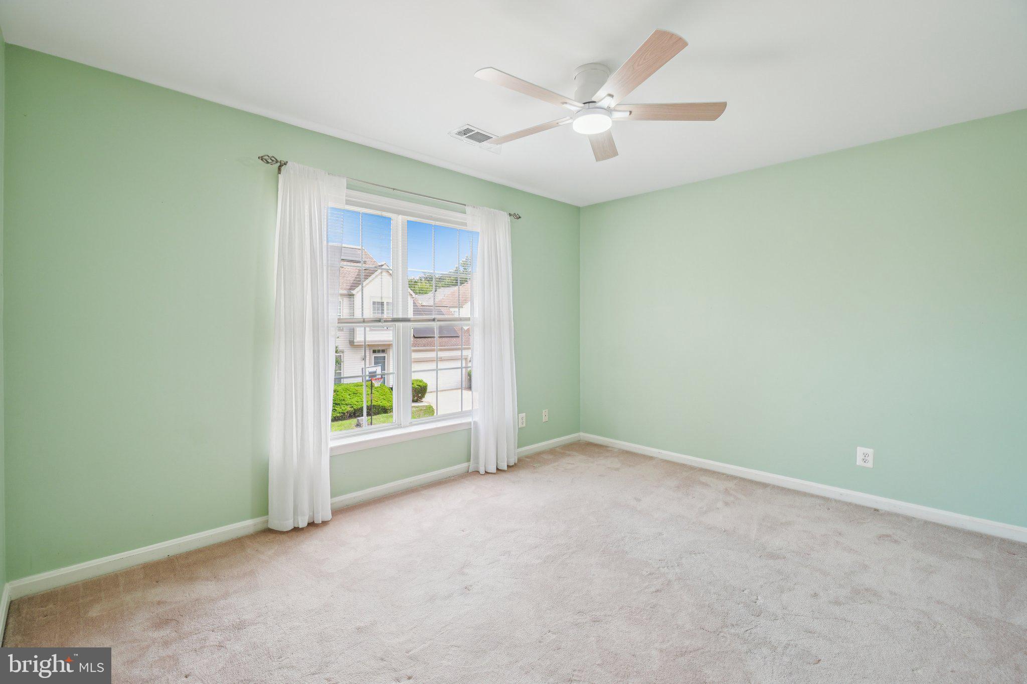12513 Fox View Way Reston, VA 20191 - Photo 16 of 39 an empty room with windows