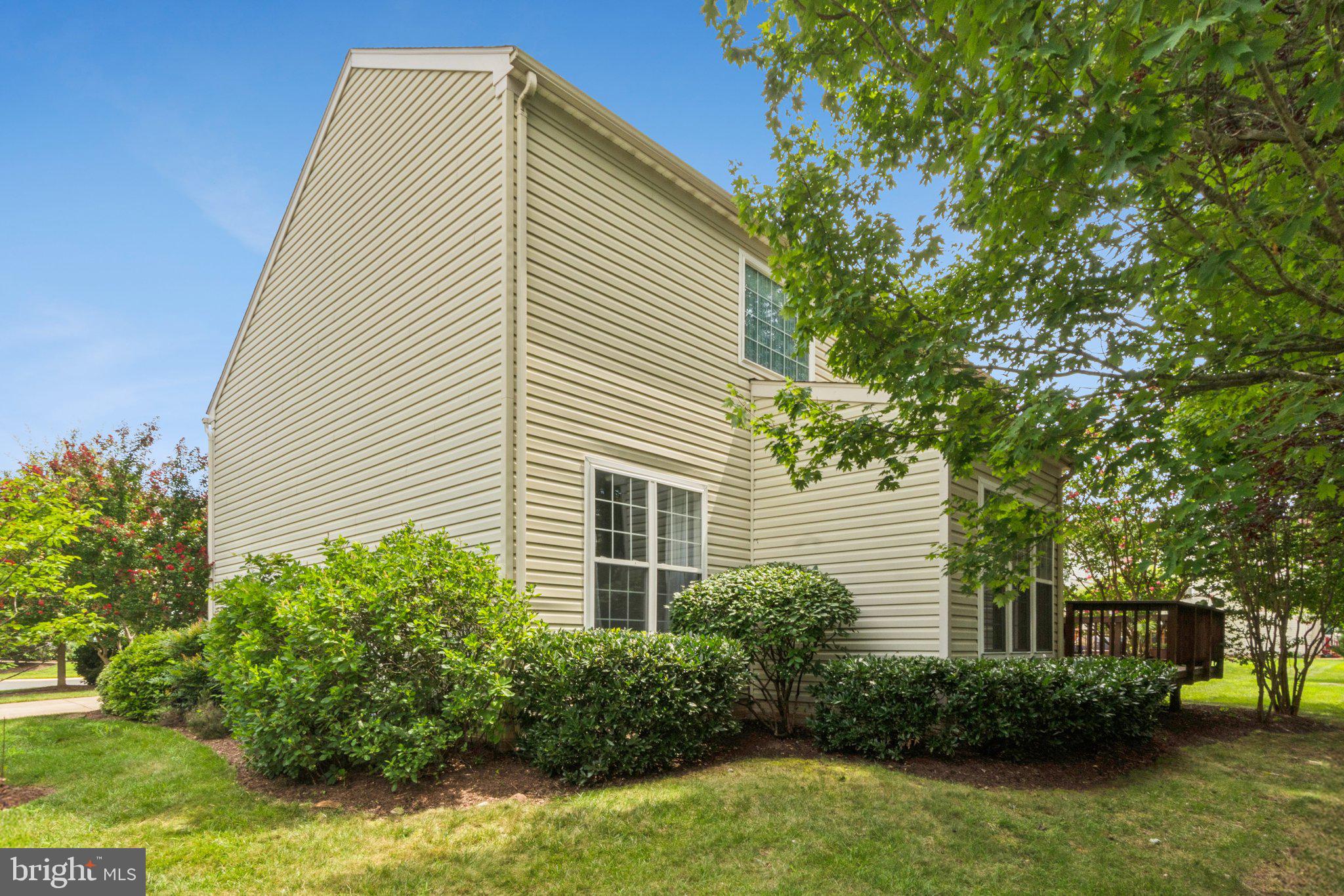 12513 Fox View Way Reston, VA 20191 - Photo 30 of 39 a view of a house with a yard