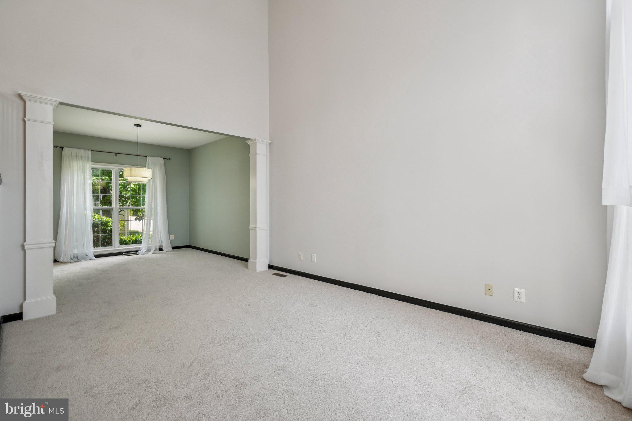 12513 Fox View Way Reston, VA 20191 - Photo 3 of 39 a view of an empty room with a window