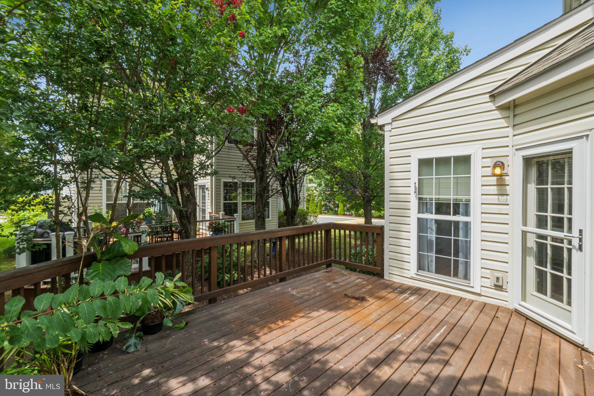 12513 Fox View Way Reston, VA 20191 - Photo 31 of 39 a view of a house with backyard and sitting area