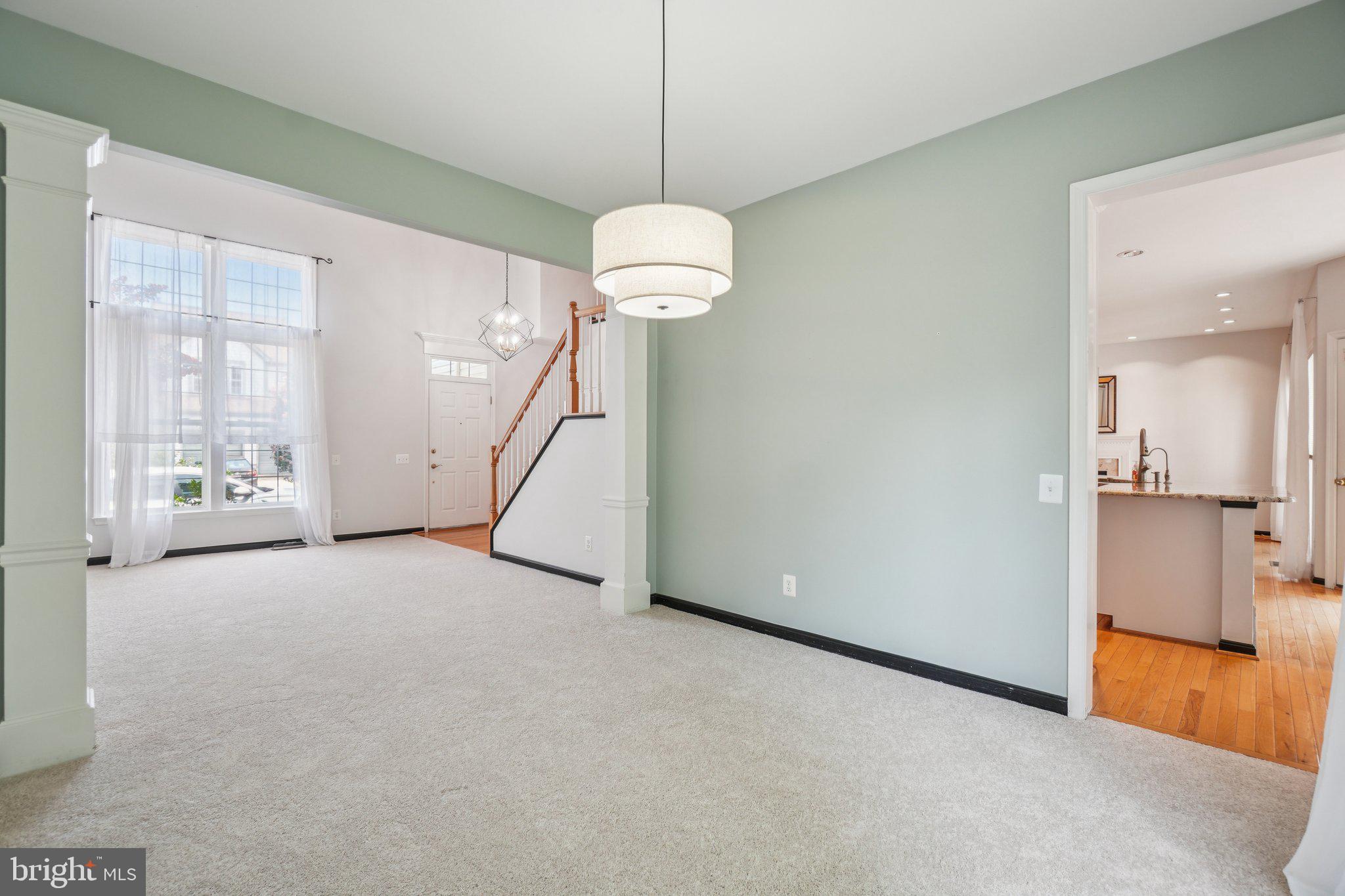 12513 Fox View Way Reston, VA 20191 - Photo 5 of 39 a view of a room with wooden floor and windows