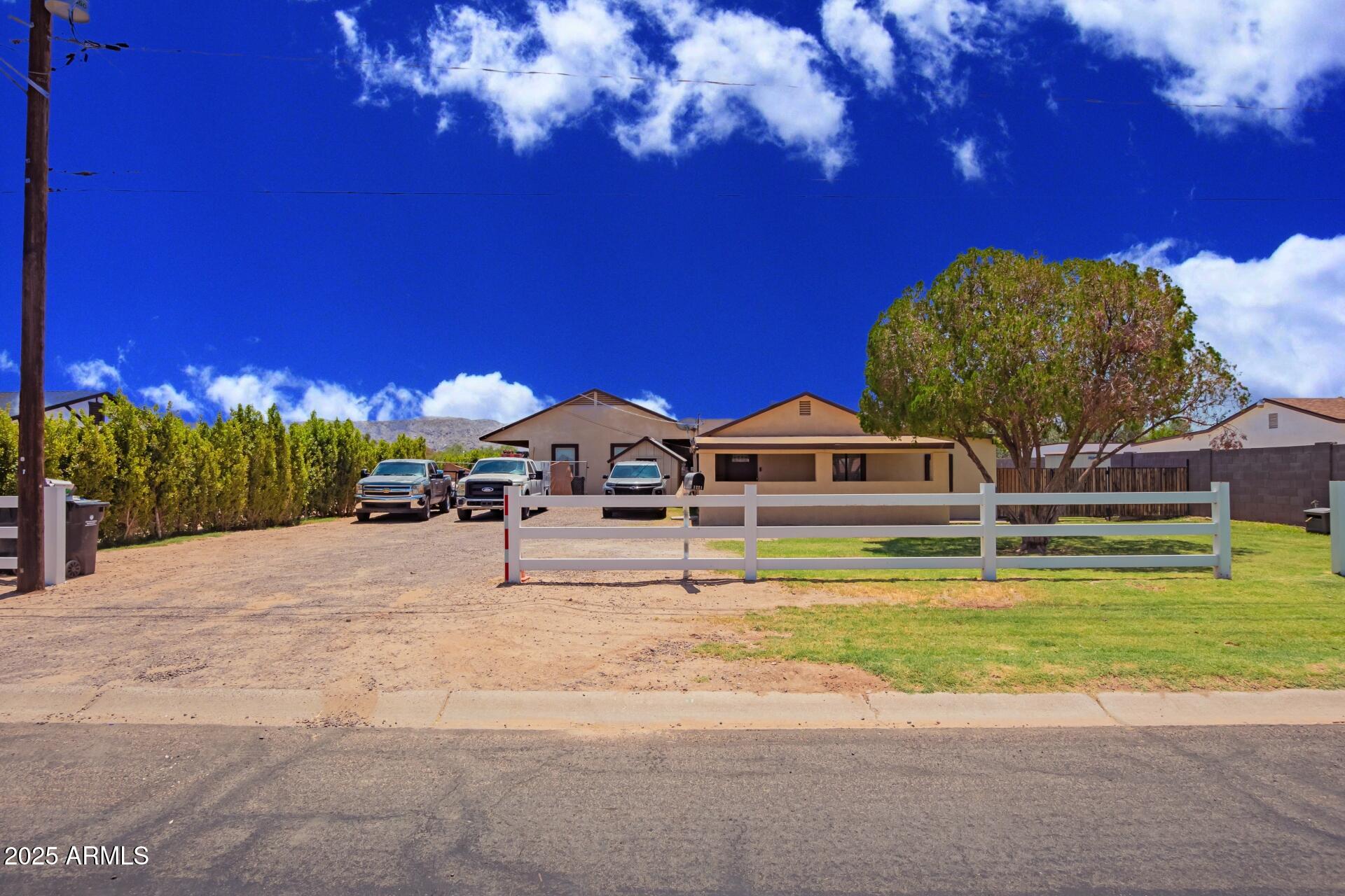 a swimming pool with outdoor seating and yard