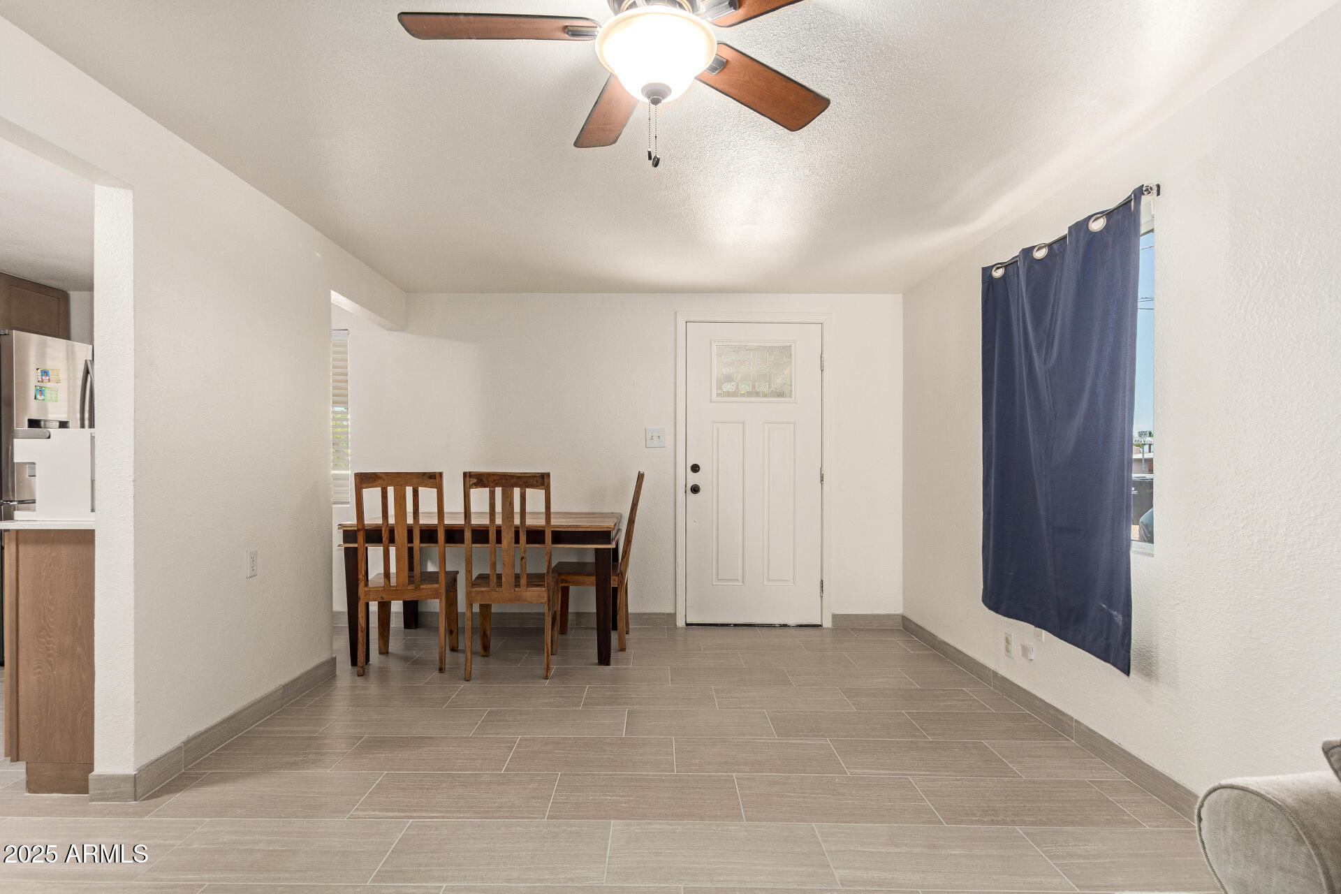 1221 East Alta Vista Road Phoenix, AZ 85042 - Photo 5 of 33 a view of a livingroom with dining room