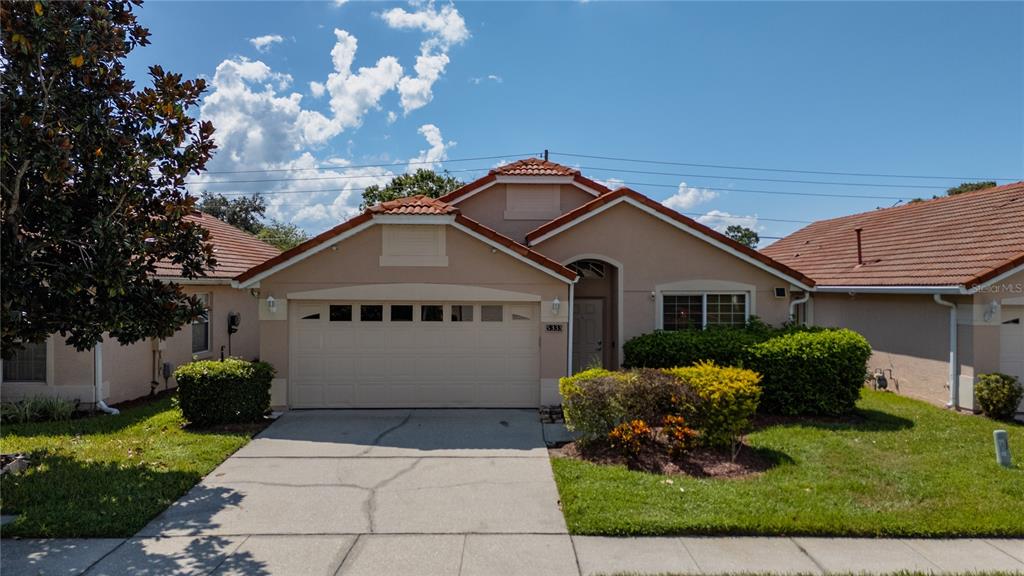 a view of house with garden
