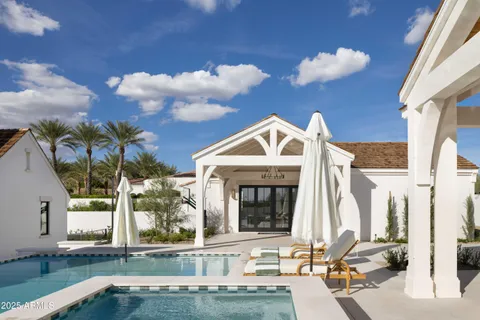a view of a house with a small yard