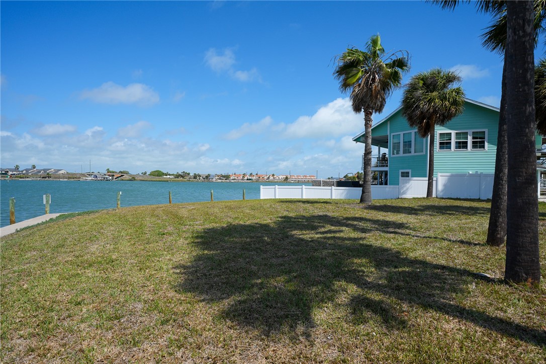 37 Riviera Drive Rockport, TX 78382 - Photo 4 of 16 a view of a lake with a big yard