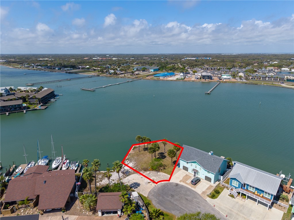 37 Riviera Drive Rockport, TX 78382 - Photo 6 of 16 an aerial view of a house with a lake view