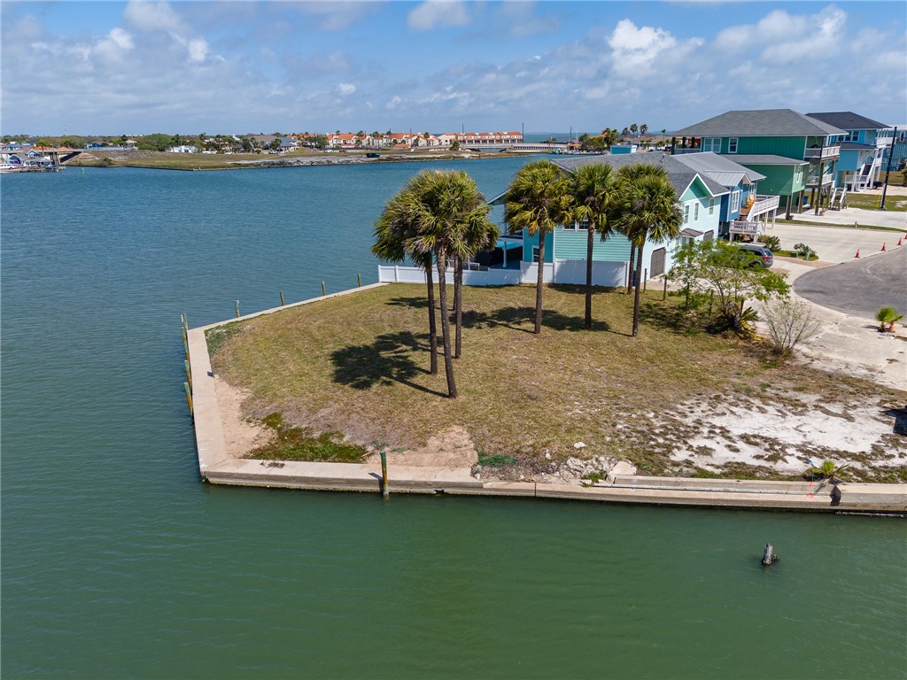 37 Riviera Drive Rockport, TX 78382 - Photo 9 of 16 a view of a lake from a building