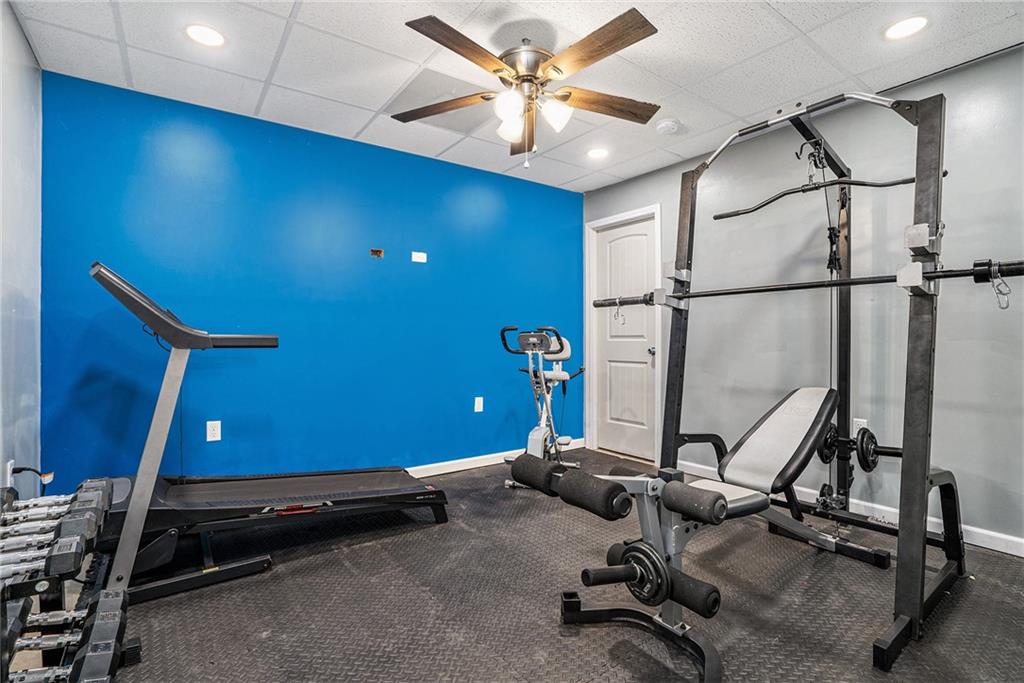 115 Floating Leaf Way Dallas, GA 30132 - Photo 36 of 47 a view of a room with gym equipment
