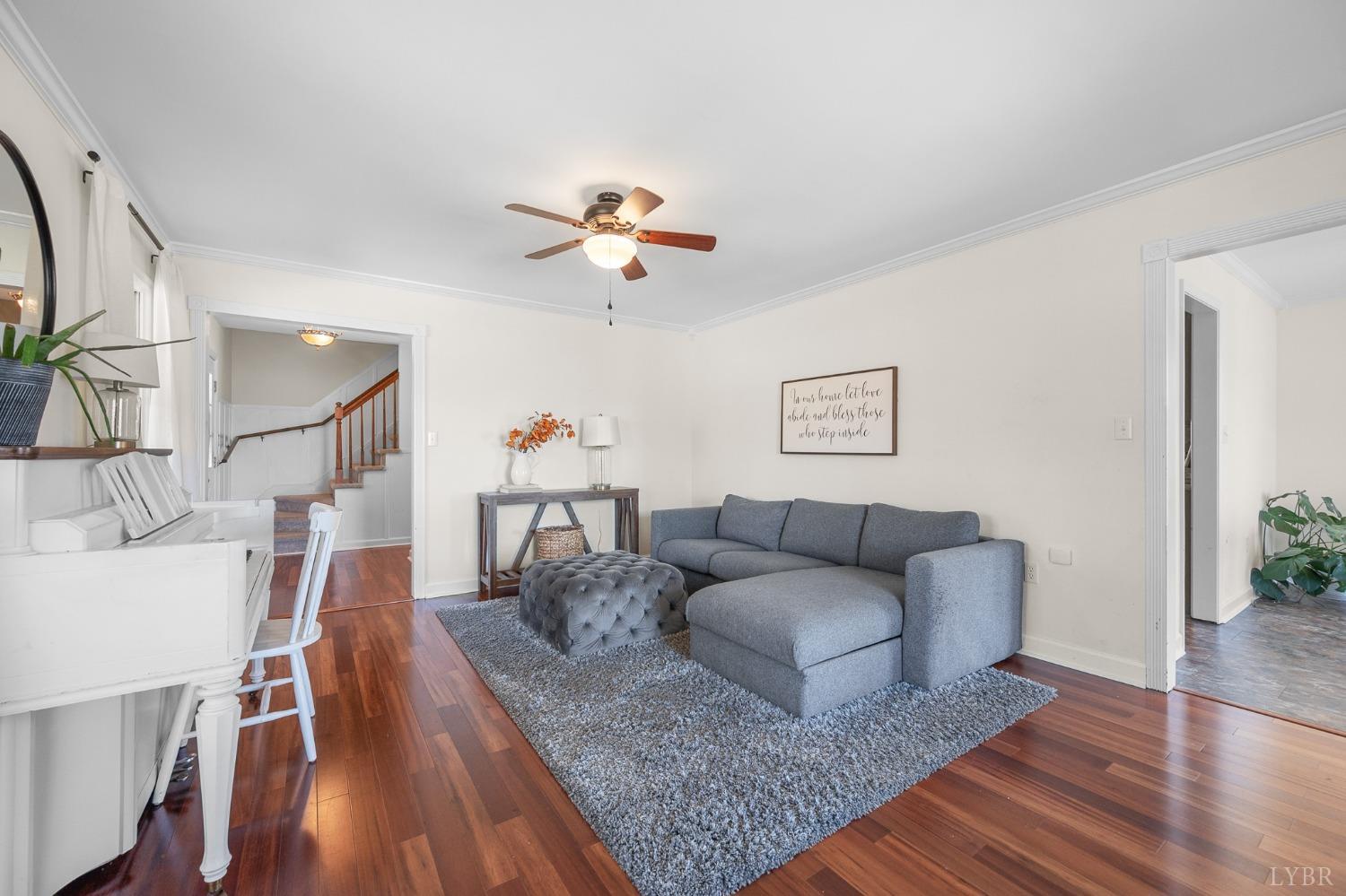 3520 Roaring Run Road Goode, VA 24556 - Photo 18 of 68 a living room with furniture and wooden floor