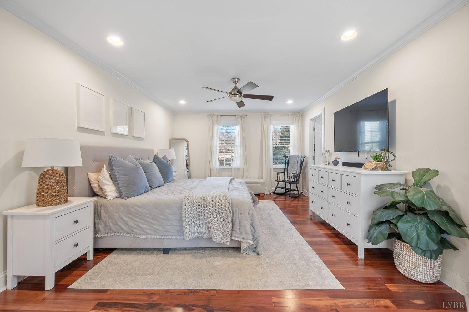 3520 Roaring Run Road Goode, VA 24556 - Photo 23 of 68 a bedroom with a bed and a flat screen tv