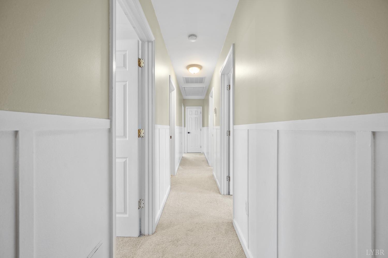 3520 Roaring Run Road Goode, VA 24556 - Photo 35 of 68 a view of a hallway with wooden floor