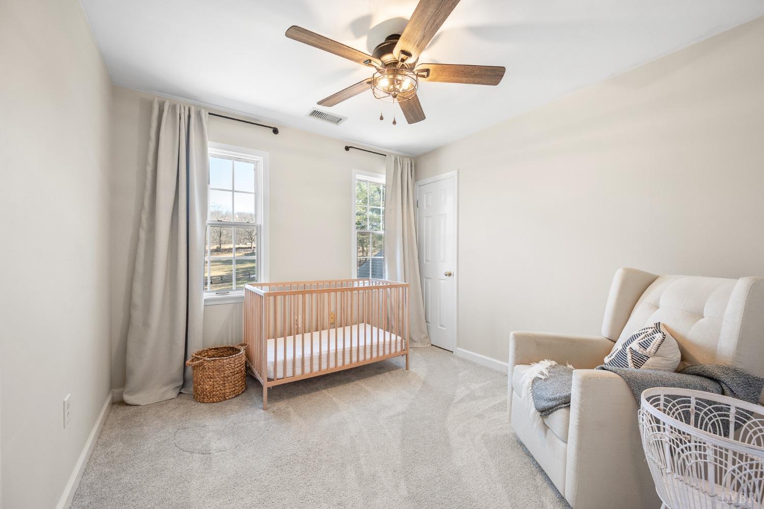 3520 Roaring Run Road Goode, VA 24556 - Photo 43 of 68 a bedroom with a bed and a window