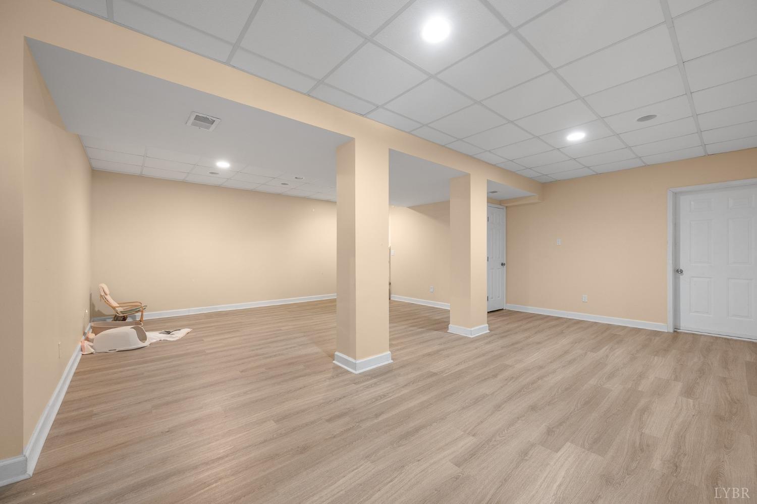 3520 Roaring Run Road Goode, VA 24556 - Photo 51 of 68 a view of empty room with wooden floor