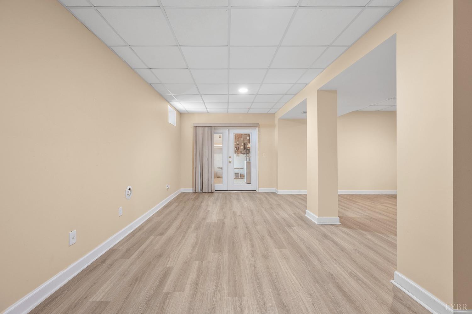 3520 Roaring Run Road Goode, VA 24556 - Photo 52 of 68 a view of an empty room with wooden floor