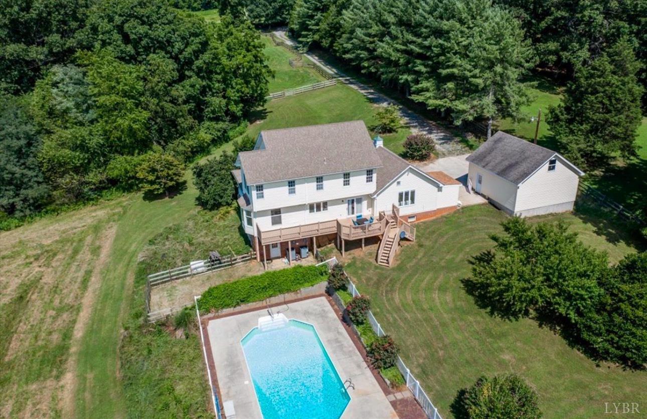 3520 Roaring Run Road Goode, VA 24556 - Photo 68 of 68 an aerial view of residential houses with outdoor space and trees