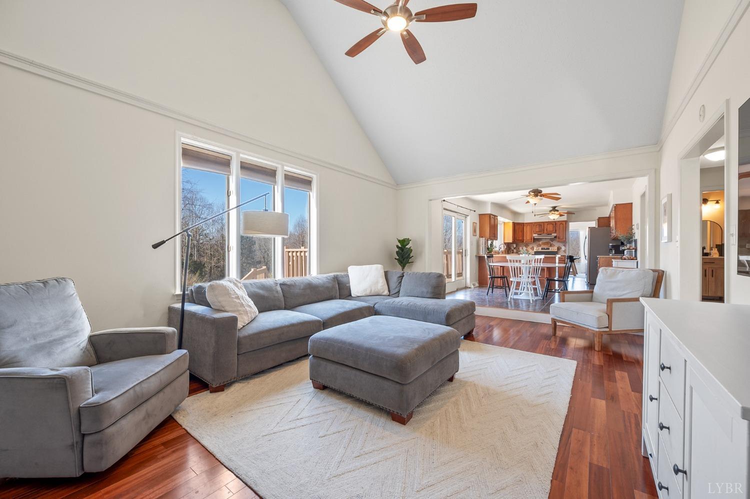 3520 Roaring Run Road Goode, VA 24556 - Photo 7 of 68 a living room with furniture and a large window
