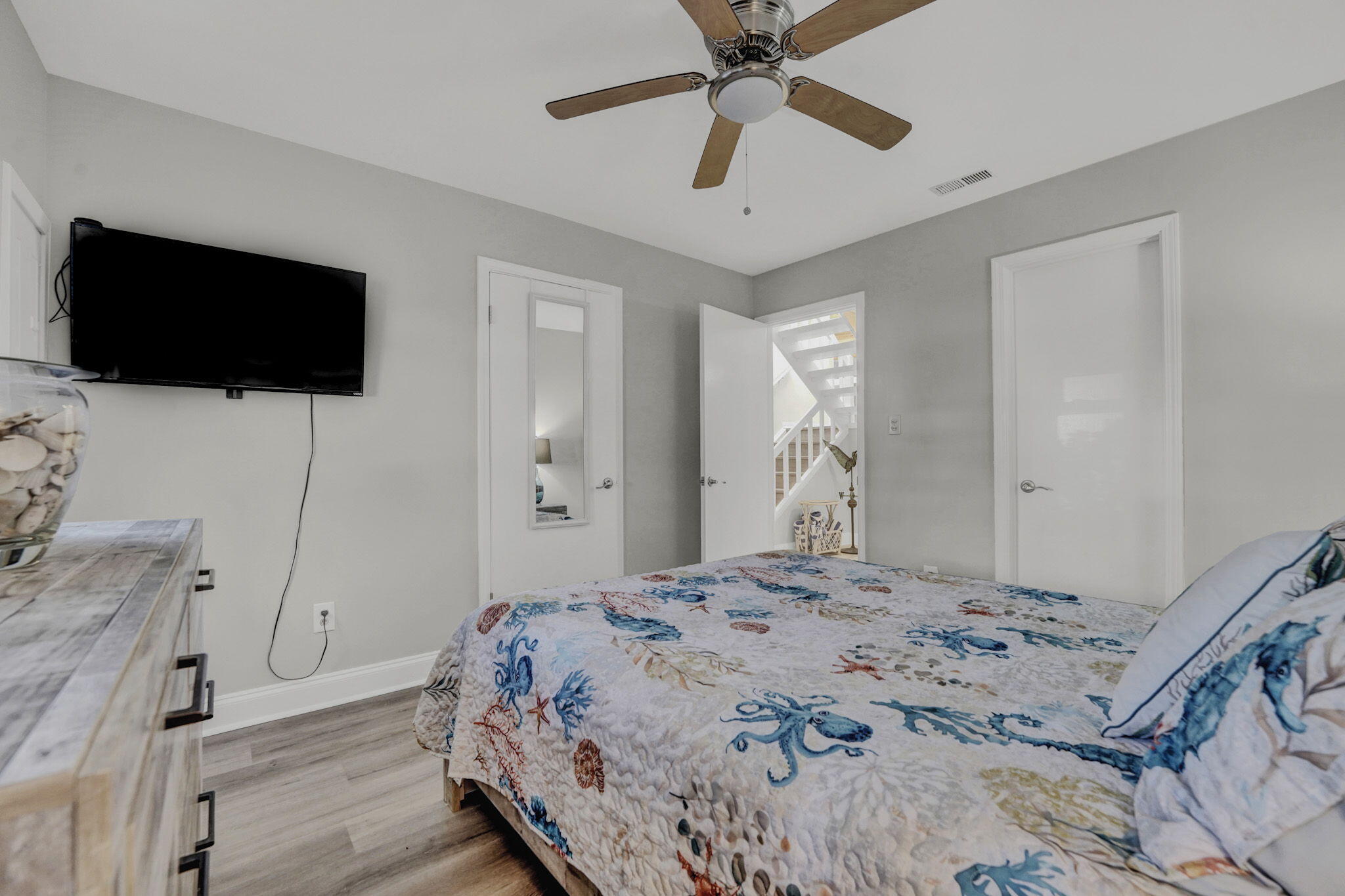 8046 East County Highway 30A Inlet Beach, FL 32461 - Photo 12 of 36 a bedroom with a bed and a flat screen tv