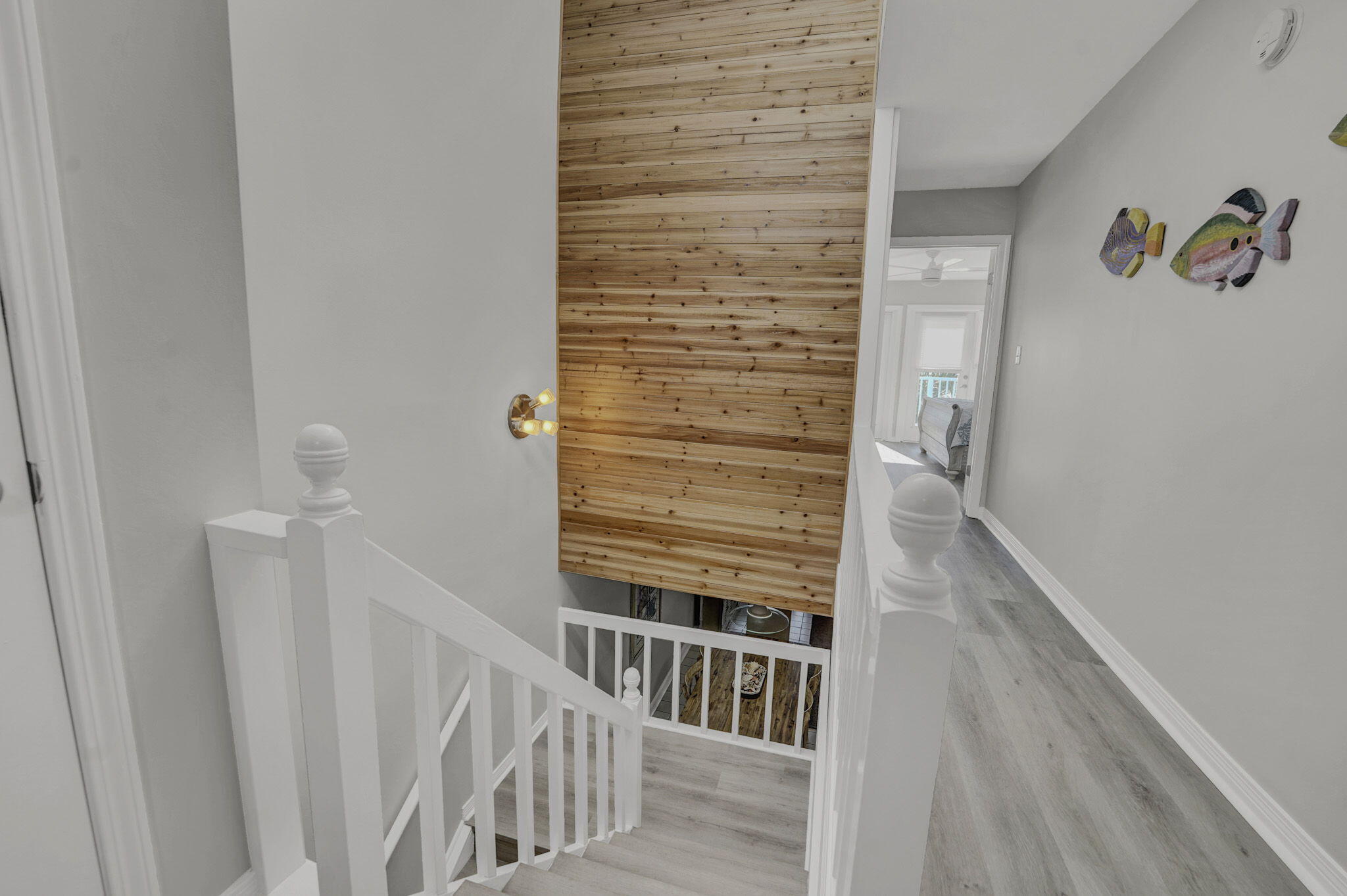 8046 East County Highway 30A Inlet Beach, FL 32461 - Photo 14 of 36 a view of staircase with wooden floor