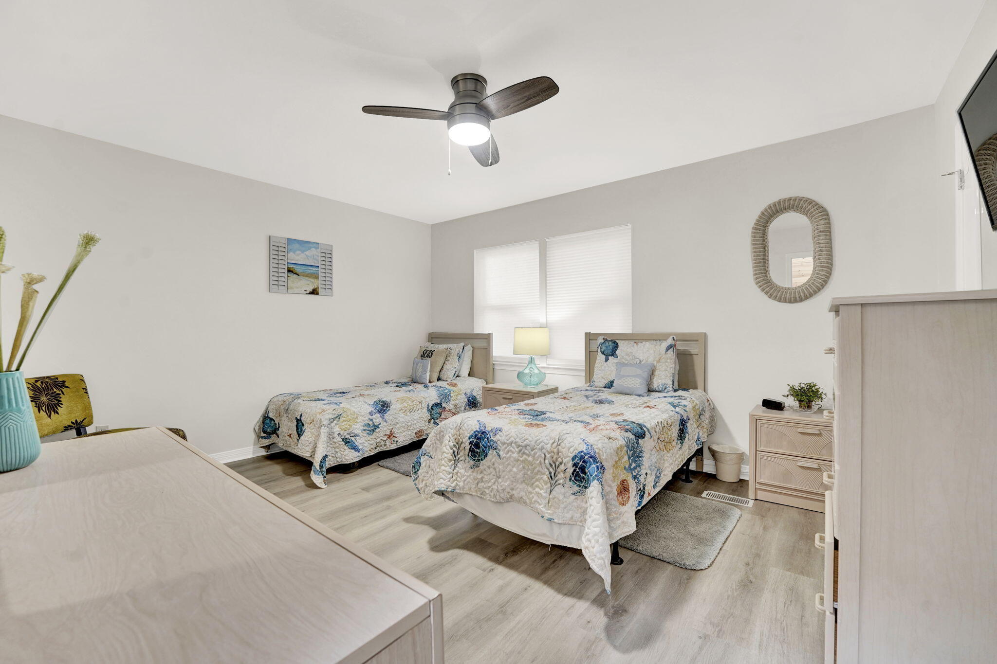 8046 East County Highway 30A Inlet Beach, FL 32461 - Photo 16 of 36 a spacious bedroom with a bed and window