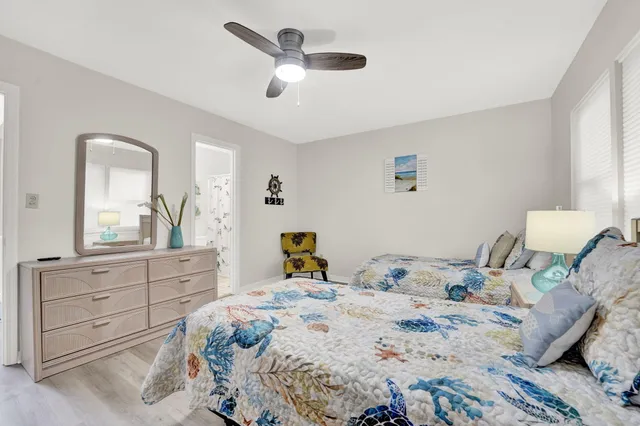 a bedroom with a bed and a dresser