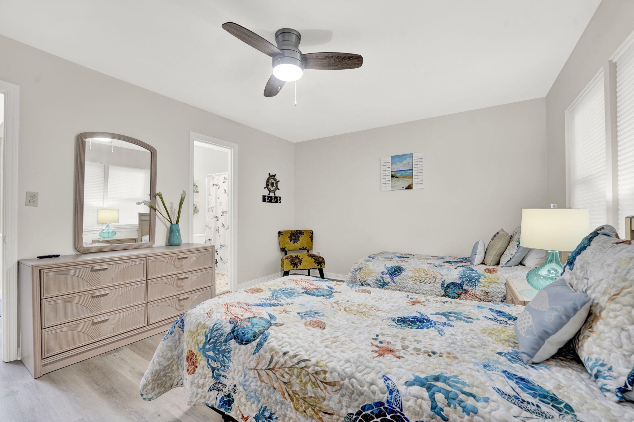 8046 East County Highway 30A Inlet Beach, FL 32461 - Photo 17 of 36 a bedroom with a bed and a dresser