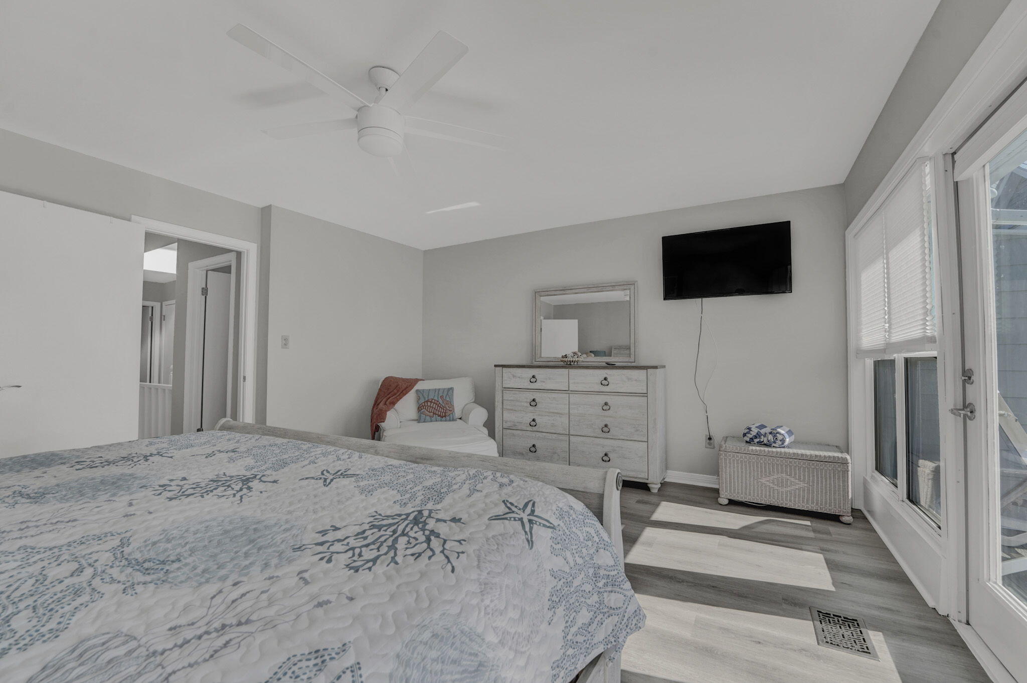 8046 East County Highway 30A Inlet Beach, FL 32461 - Photo 23 of 36 a bedroom with a bed and a flat screen tv