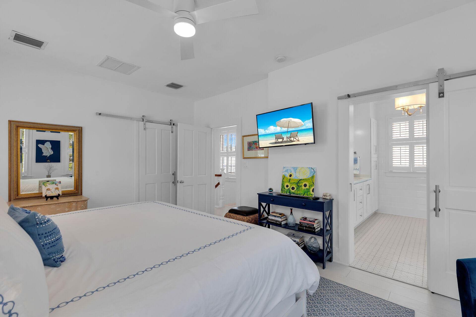 1309 Petronia Street Key West, FL 33040 - Photo 13 of 38 a bedroom with a bed a dresser and next to a window