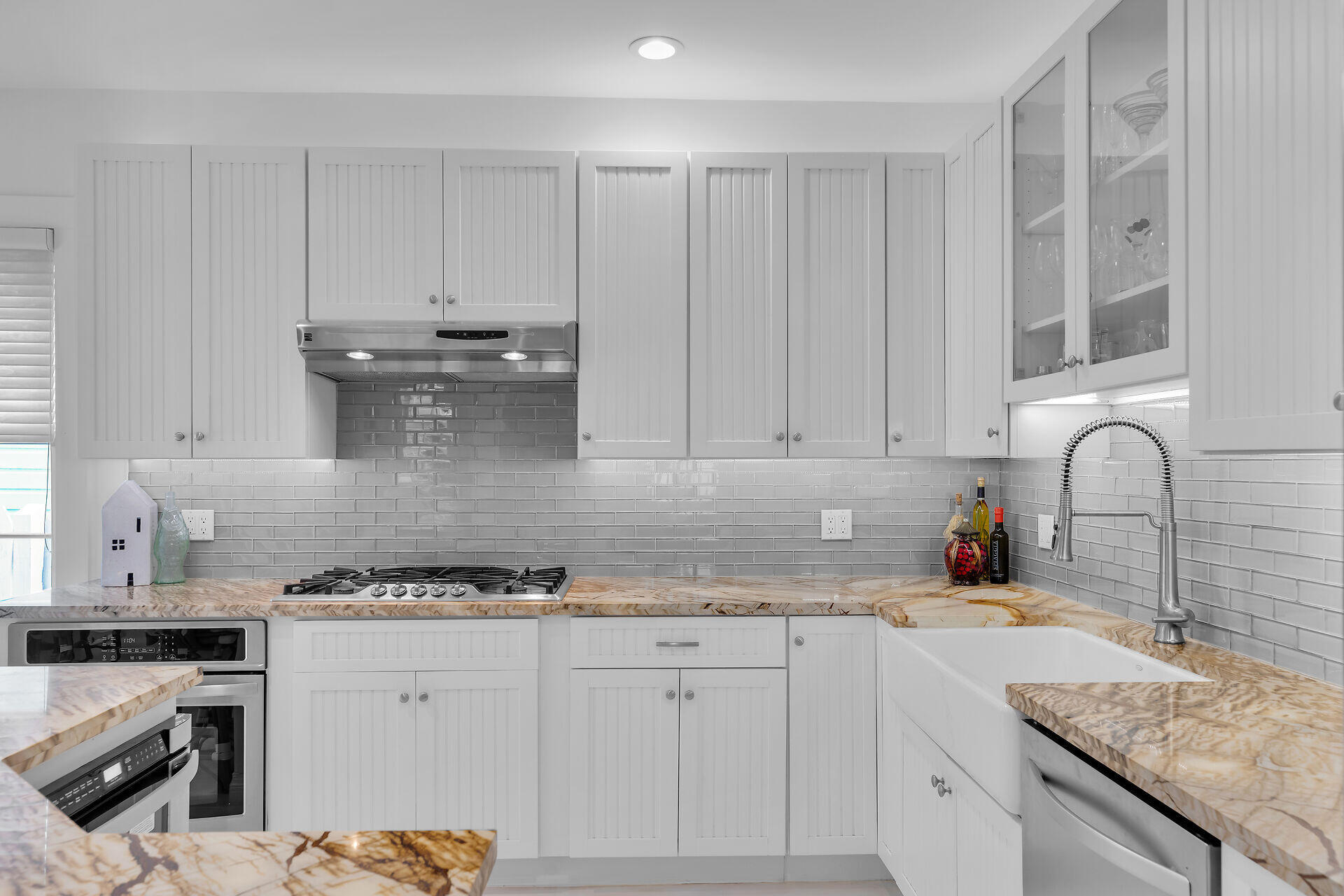 1309 Petronia Street Key West, FL 33040 - Photo 19 of 38 a kitchen with granite countertop a sink stainless steel appliances and cabinets