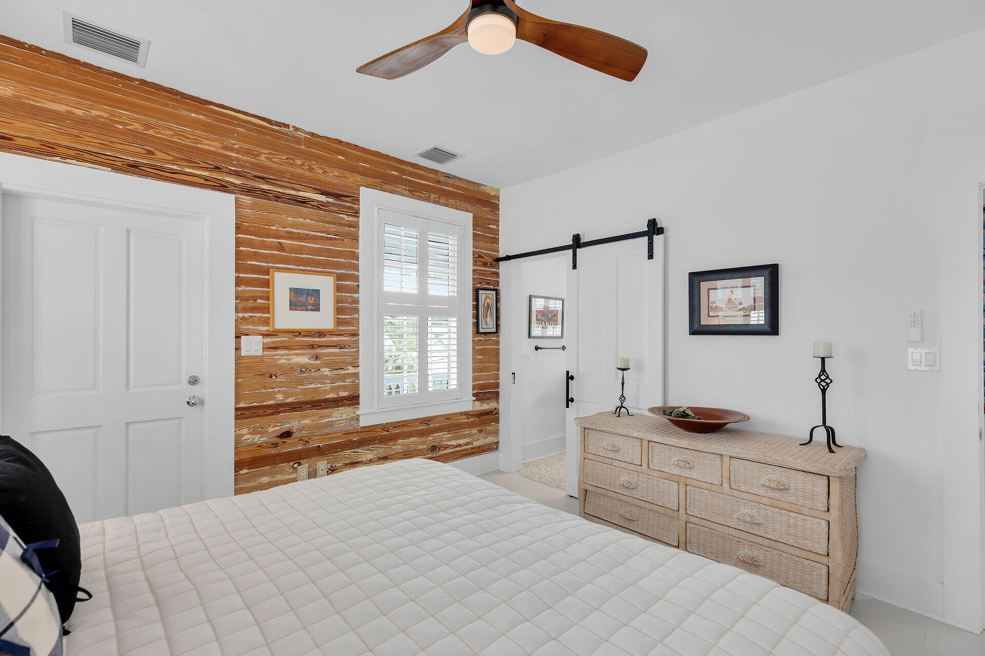 1309 Petronia Street Key West, FL 33040 - Photo 8 of 38 a bedroom with a bed and a window