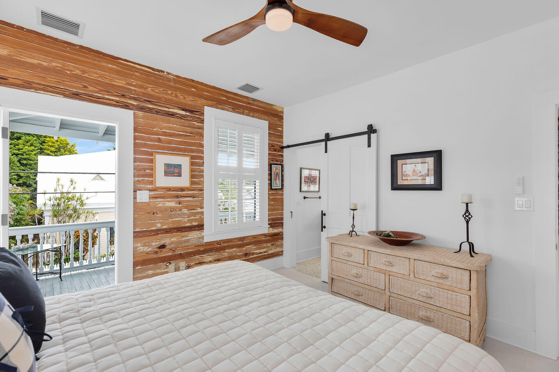 1309 Petronia Street Key West, FL 33040 - Photo 9 of 38 a bedroom with a bed and a window