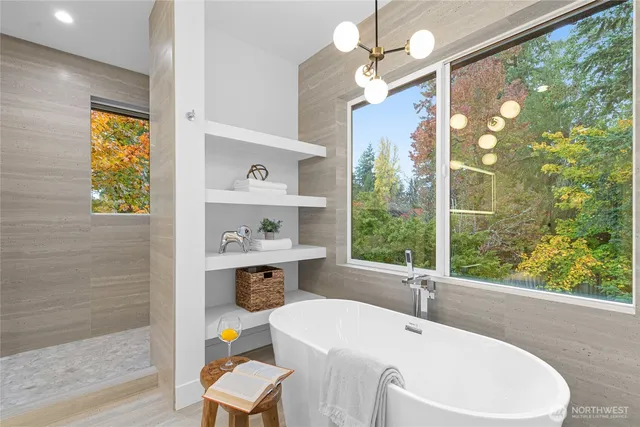 a bathroom with a sink a toilet and a window