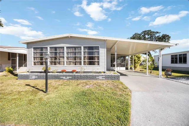 a swimming pool with outdoor seating