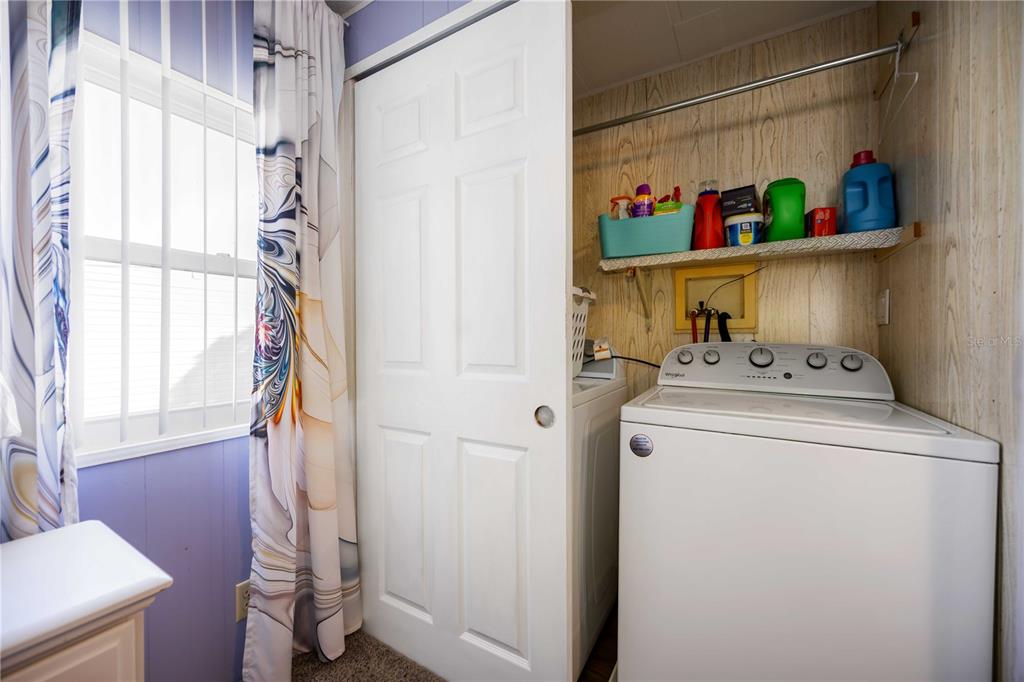 10303 Burnt Store Road, Unit 169 Punta Gorda, FL 33950 - Photo 21 of 34 a utility room with dryer and washer