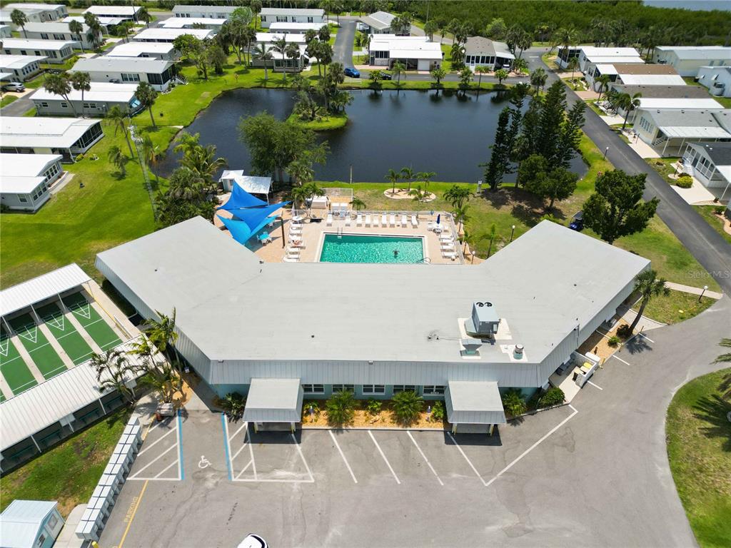 10303 Burnt Store Road, Unit 169 Punta Gorda, FL 33950 - Photo 26 of 34 an aerial view of a building with outdoor space