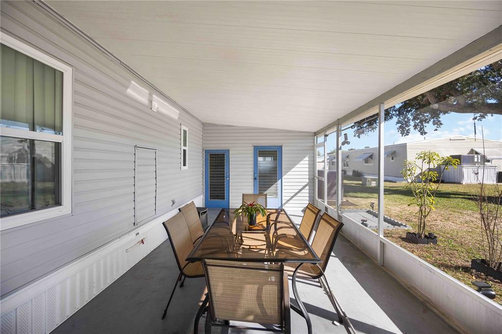 10303 Burnt Store Road, Unit 169 Punta Gorda, FL 33950 - Photo 4 of 34 a view of a two chair in the balcony