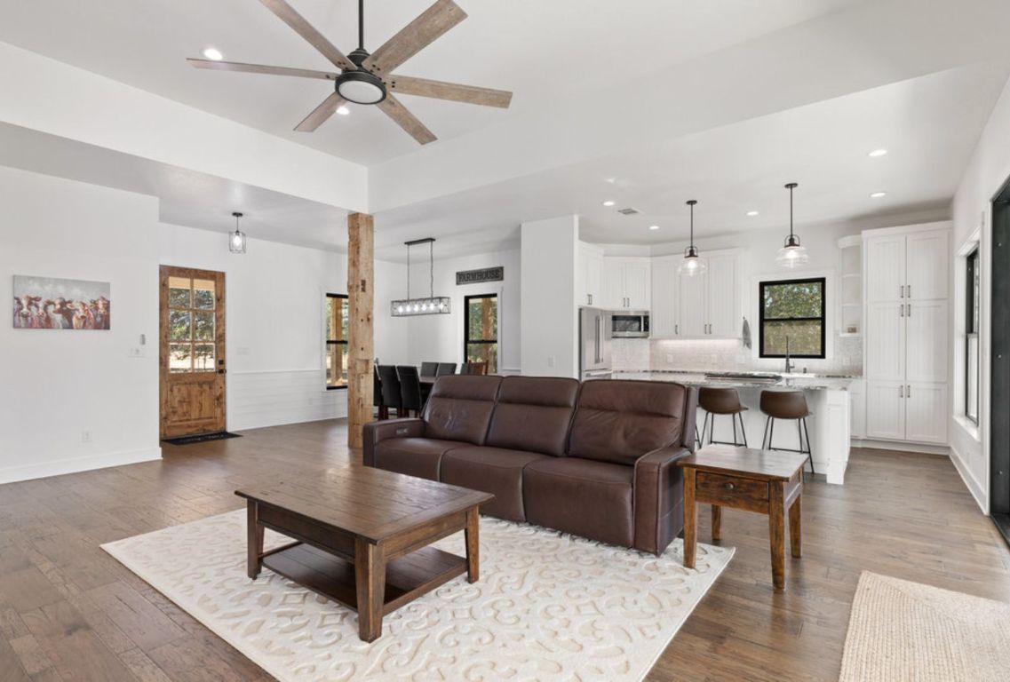 340 Mark Young Road Smithville, TX 78957 - Photo 16 of 40 a living room with furniture and kitchen view