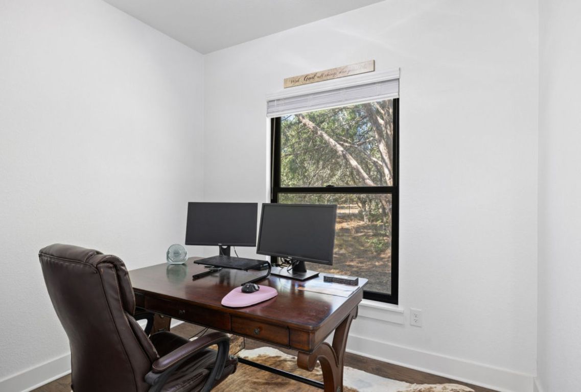 340 Mark Young Road Smithville, TX 78957 - Photo 25 of 40 a view of a workspace with furniture