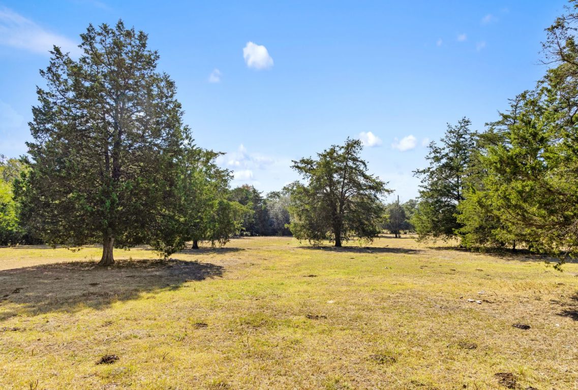 340 Mark Young Road Smithville, TX 78957 - Photo 38 of 40 a view of swimming pool with a yard